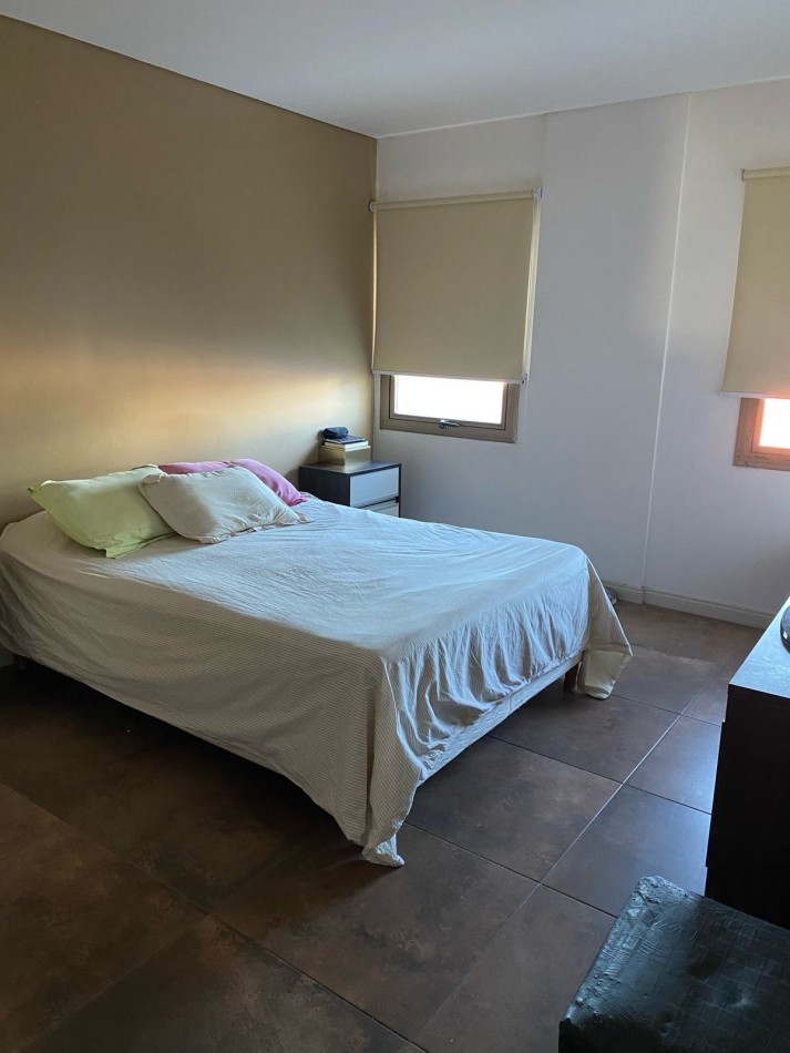 Departamento tres ambientes con cochera 