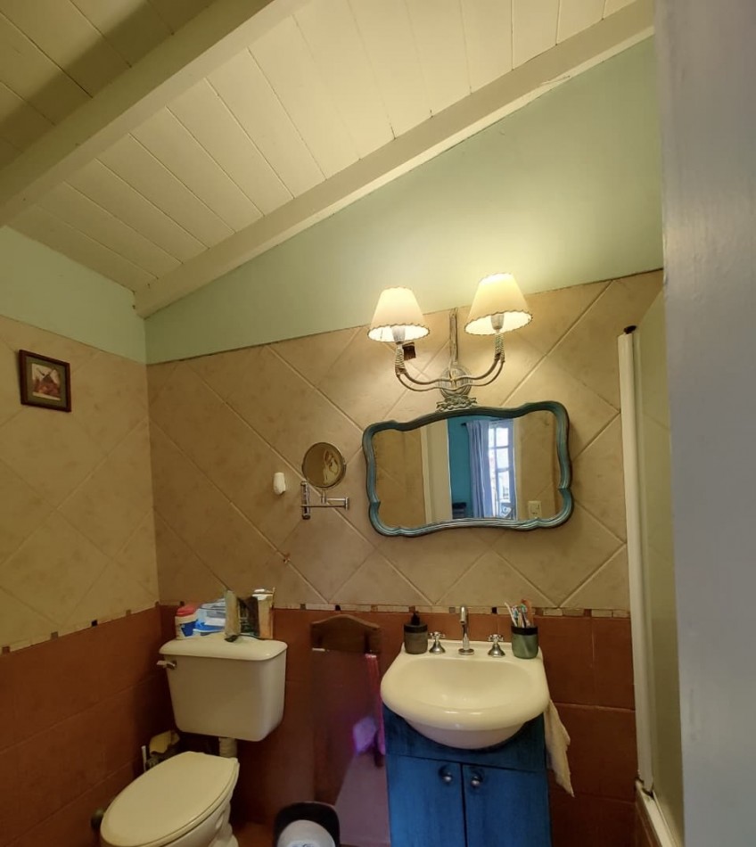 Venta departamento 4 ambientes con patio y cochera  