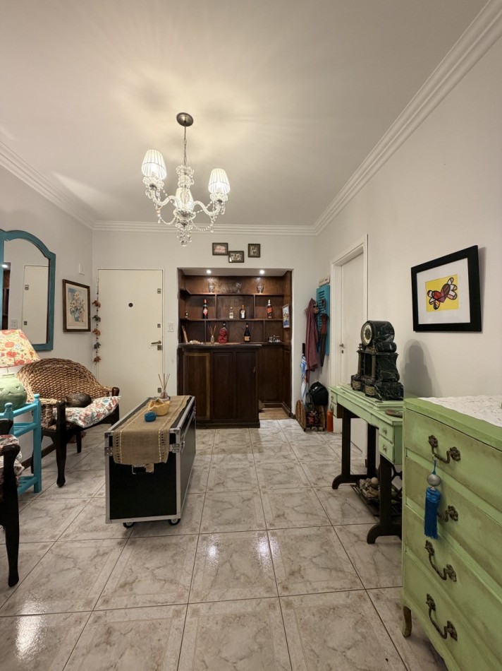 Venta departamento 4 ambientes con patio y cochera  