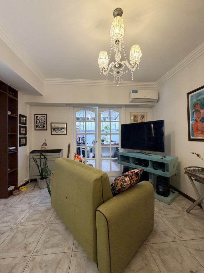 Venta departamento 4 ambientes con patio y cochera  