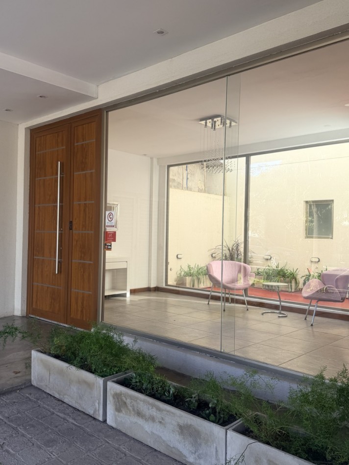 Departamento tres ambientes con cochera 